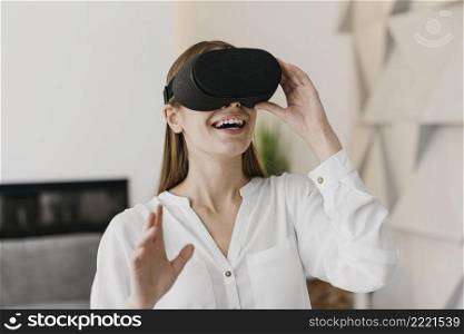 woman using virtual reality headset smiles