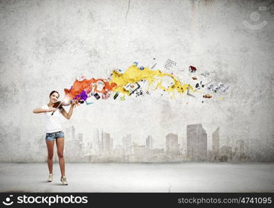 Woman violinist. Young attractive woman in casual playing violin