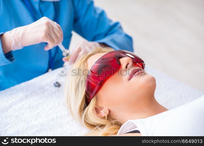 Woman visiting doctor for plastic surgery 