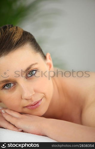 Woman waiting for a message at the spa