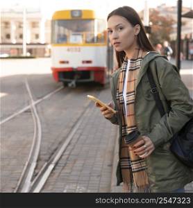 woman waiting tramway station 2