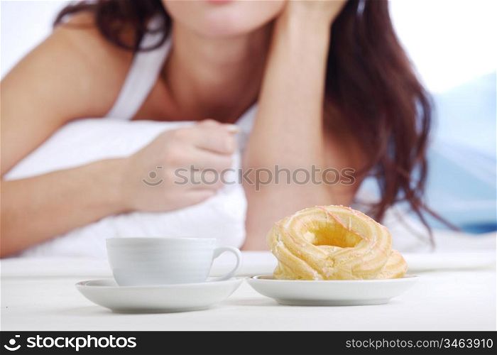 woman wake and see morning coffee