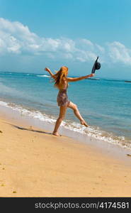 Woman walking on the beach