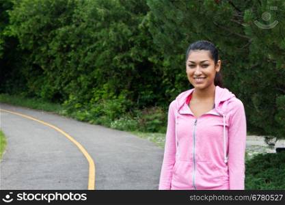 Woman walking on the jogging path