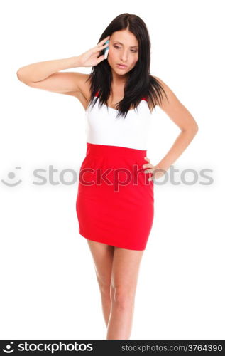 woman walking talking on mobile phone isolated on white background