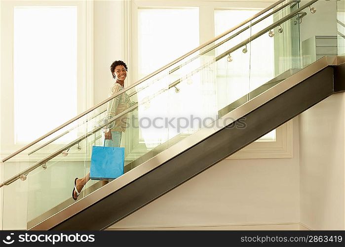 Woman Walking up Stairway