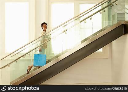 Woman Walking up Stairway