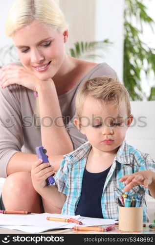 Woman watching her son playing