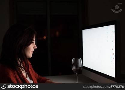 Woman watching online content on desktop