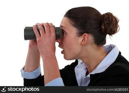 Woman watching through binoculars