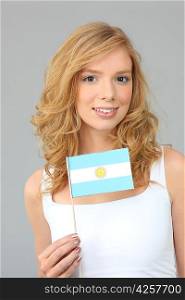 Woman waving an Argentinean flag