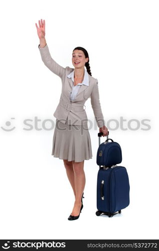 Woman waving goodbye