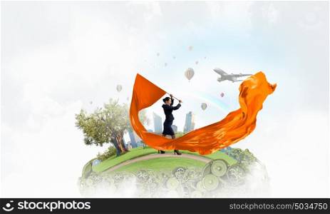 Woman waving yellow flag. Determined businesswoman waving flag as symbol of power