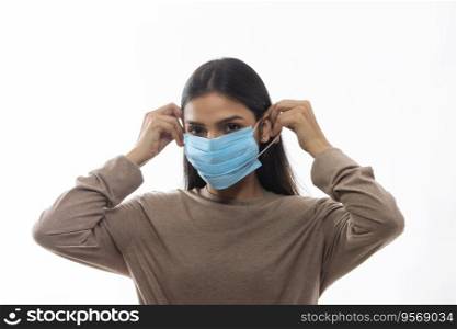 Woman wearing a mask to protect herself from infections