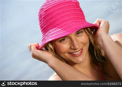 Woman wearing a pink hat