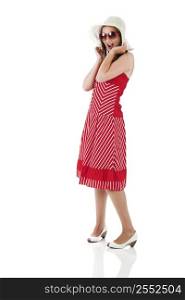 Woman wearing a red dress in a studio