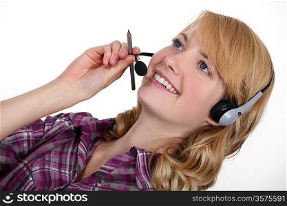 Woman wearing a telephone headset