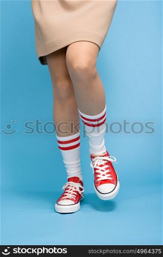 Woman wearing baseball boots