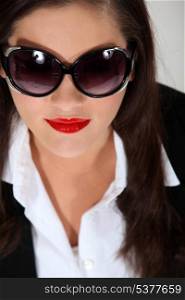 Woman wearing bug-eye sunglasses