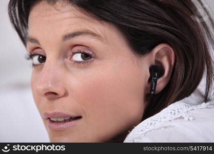 Woman wearing earphones