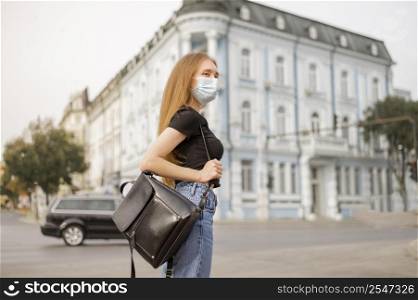 woman wearing face mask outside
