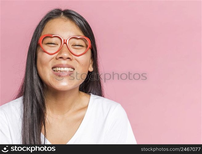 woman wearing glasses smiling