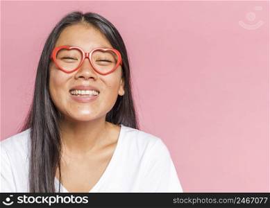 woman wearing glasses smiling