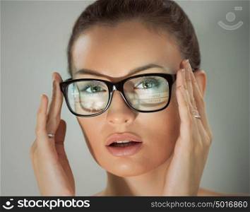 Woman wearing glasses with virtual interface and built-in screen