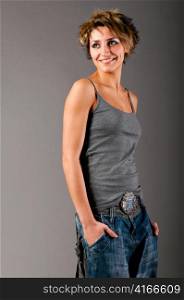 woman wearing gray tank top and jeans