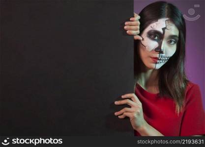 woman wearing halloween costume wall