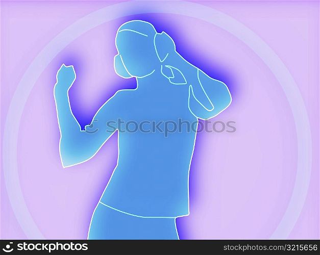 Woman wearing headphones and dancing