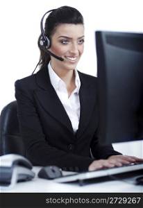 Woman wearing headset in computer room at her cabin over white background