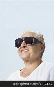 Woman wearing large sunglasses