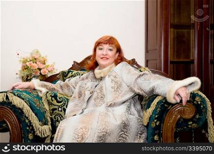 woman wearing luxurious fur coat with mink