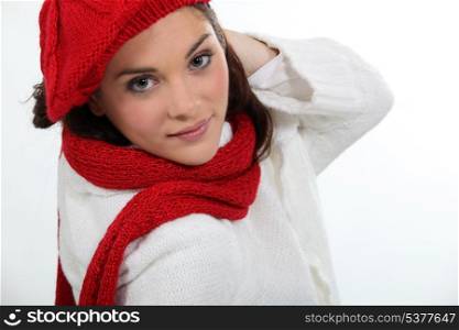 Woman wearing matching hat and scarf