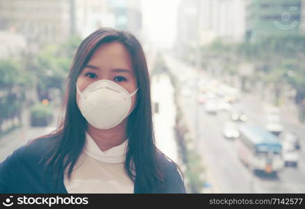woman wearing protective mask in the city street, Bangkok thailand