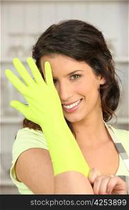 Woman wearing rubber gloves
