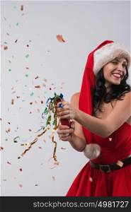 Woman wearing Santa Claus dress and hat celebrating Christmas
