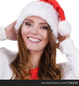 Woman wearing santa claus hat free and happy laughing. Smiling joyful girl having fun. Christmas time. Studio shot on white. Woman in santa claus hat free and happy