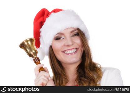 Woman wearing santa claus hat ringing a bell. Happiness holidays Christmas time concept. Studio shot isolated on white. Woman in santa claus hat ringing a bell