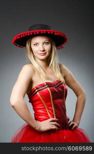 Woman wearing sombrero hat in funny concept