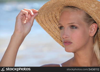 Woman wearing straw hat