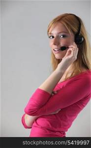 Woman wearing telephone head-set