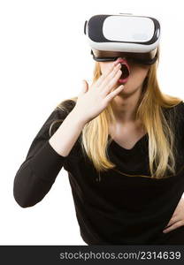 Woman wearing virtual reality goggles headset, vr box. Connection, technology, new generation and progress concept.. Woman wearing VR goggles