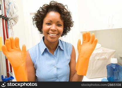 Woman wearing washing up gloves