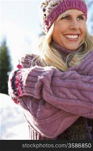 Woman wearing winter clothing smiling portrait