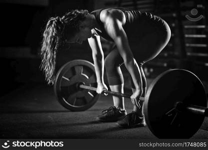 Woman weightlifting on training