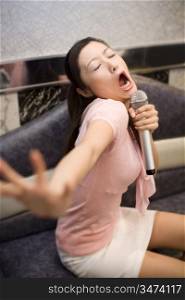 Woman who does karaoke