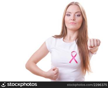 Woman wih pink ribbon on chest punching boxing. Fight against disease. Healthcare, medicine and breast cancer awareness concept, isolated on white. Woman wih pink ribbon on chest punching boxing