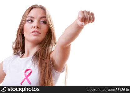 Woman wih pink ribbon on chest punching boxing. Fight against disease. Healthcare, medicine and breast cancer awareness concept, isolated on white. Woman wih pink ribbon on chest punching boxing